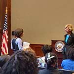 Senator Tammy Baldwin answers a question from a student.
